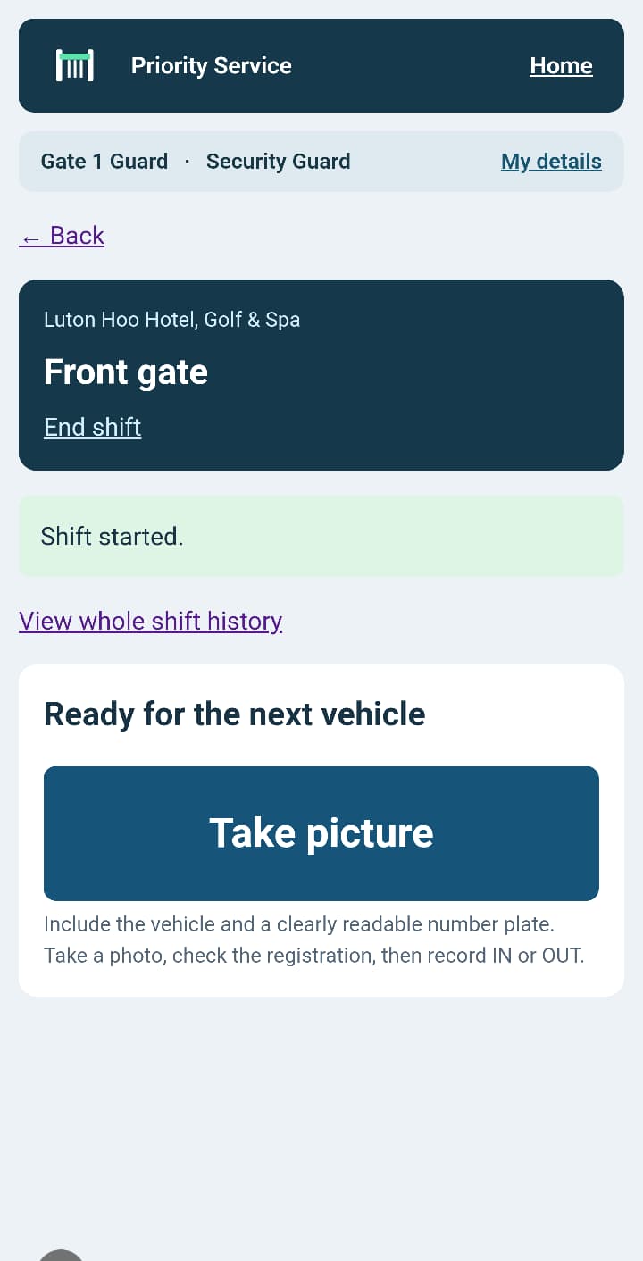 Guard capture screen: Ready for the next vehicle, Take picture, and instructions to check the registration before recording IN or OUT.